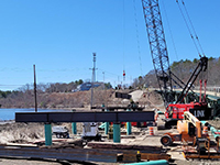View of temporary substructure units for temporary Station 46 Bridge, looking south towards the Taste of Maine Restaurant.